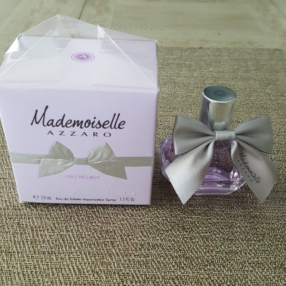 Sephora Lavender Mademoiselle Azzaro Perfume Bottle with Silver Bow. 3/4 full.